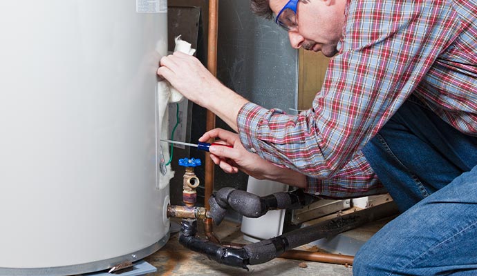 Professional repairing boiler using equipment