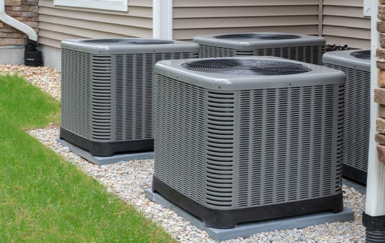 Outdoor air conditioning unit installed in a home.