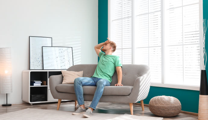 A person sitting on sofa